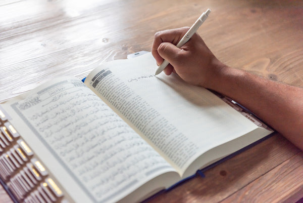 Writing in Quran Notebook (Quran Journal)