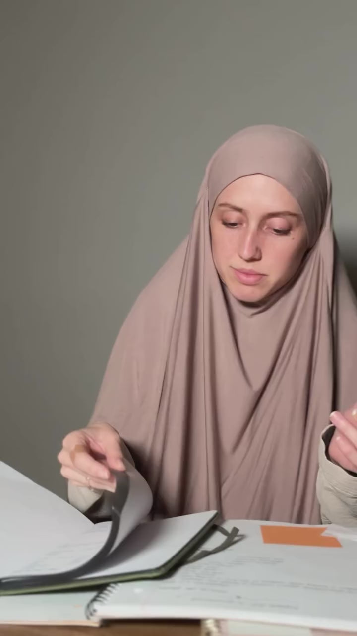 NATASHAA MICHELLE USING QURAN NOTEBOOK